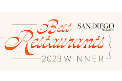 The image shows a "Best Restaurants 2023 Winner" award from San Diego Magazine, with elegant red and black text on a light background.